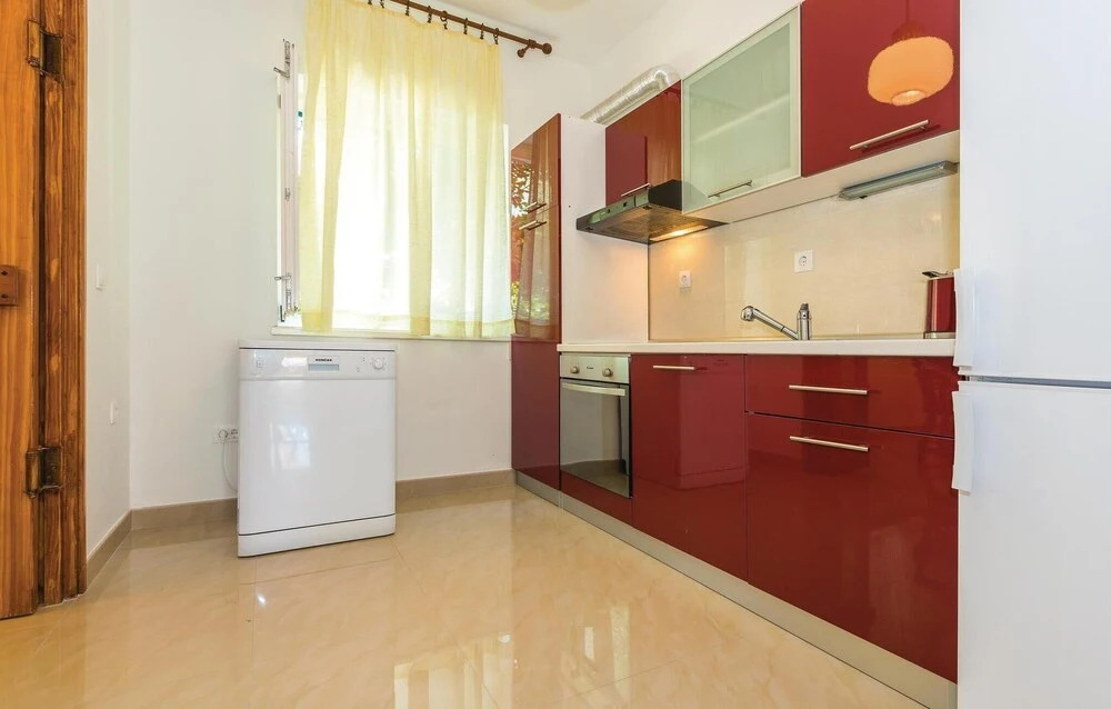Four-Bedroom Holiday Home In Brodarica