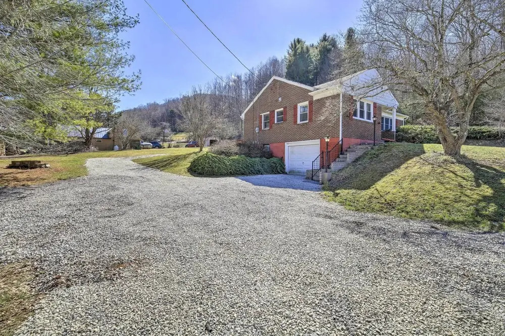Quaint Creekside Home w/ Spacious Deck & Yard