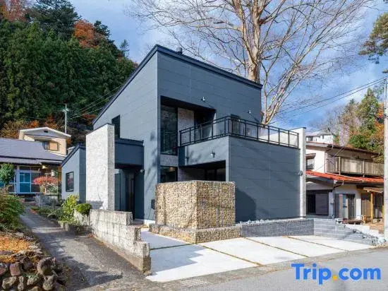 River view house with BBQ & private sauna, wood stove — designer villa with stone terrace & fire