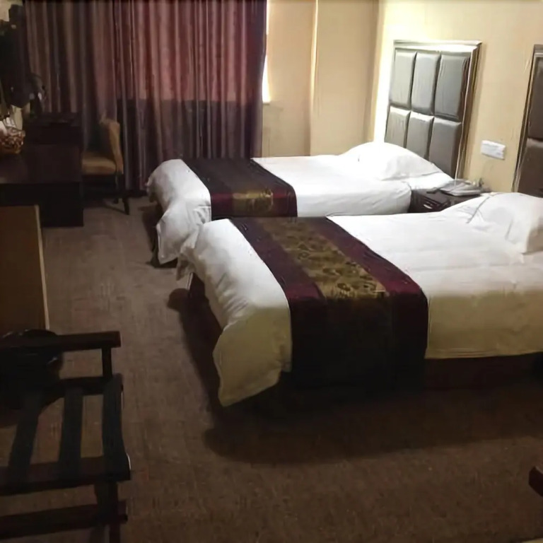 Motai Business Hotel Tonglu