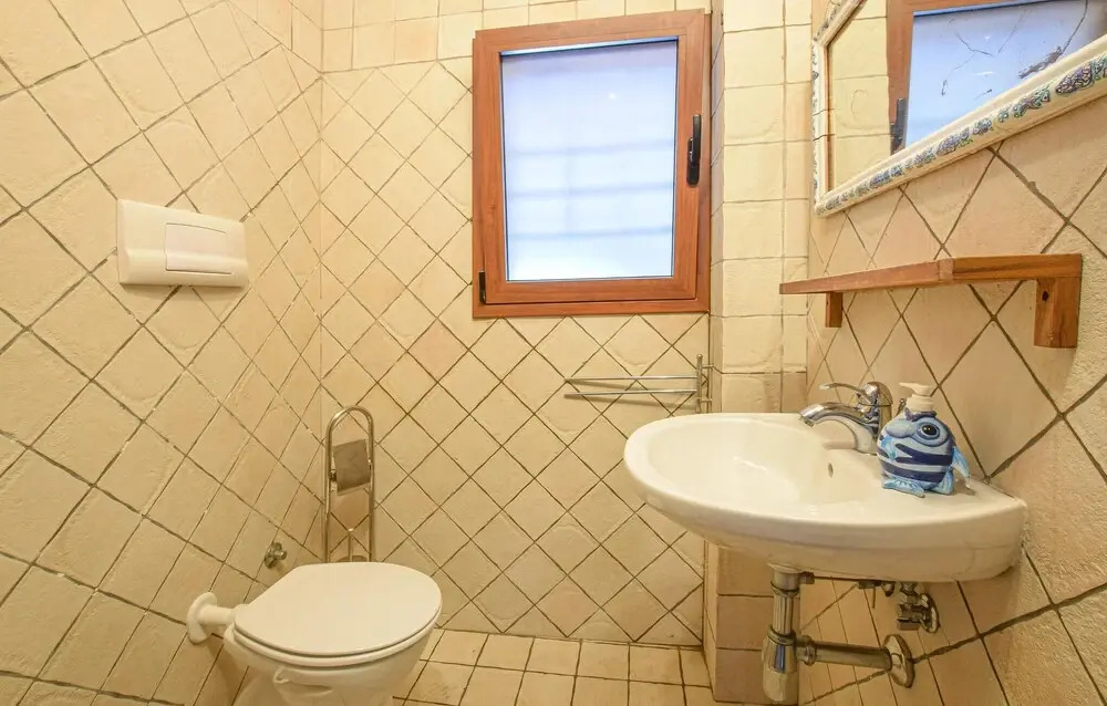 Beautiful Apartment in Monte Petrosu With Outdoor Swimming Pool and 3 Bedrooms