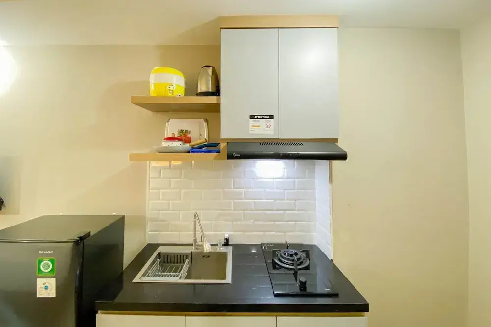 Homey and Well Furnished Studio LRT City Jatibening Apartment