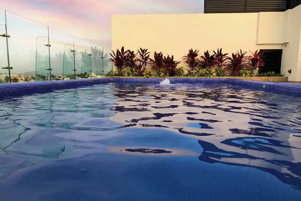 Luxe Condos Complex with Roof Pool