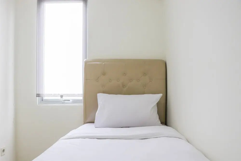 Cozy and Beautiful 2BR Bassura City Apartment By Travelio