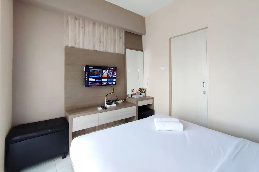 Homey 1BR without Living Room at Amartha View Apartment By Travelio