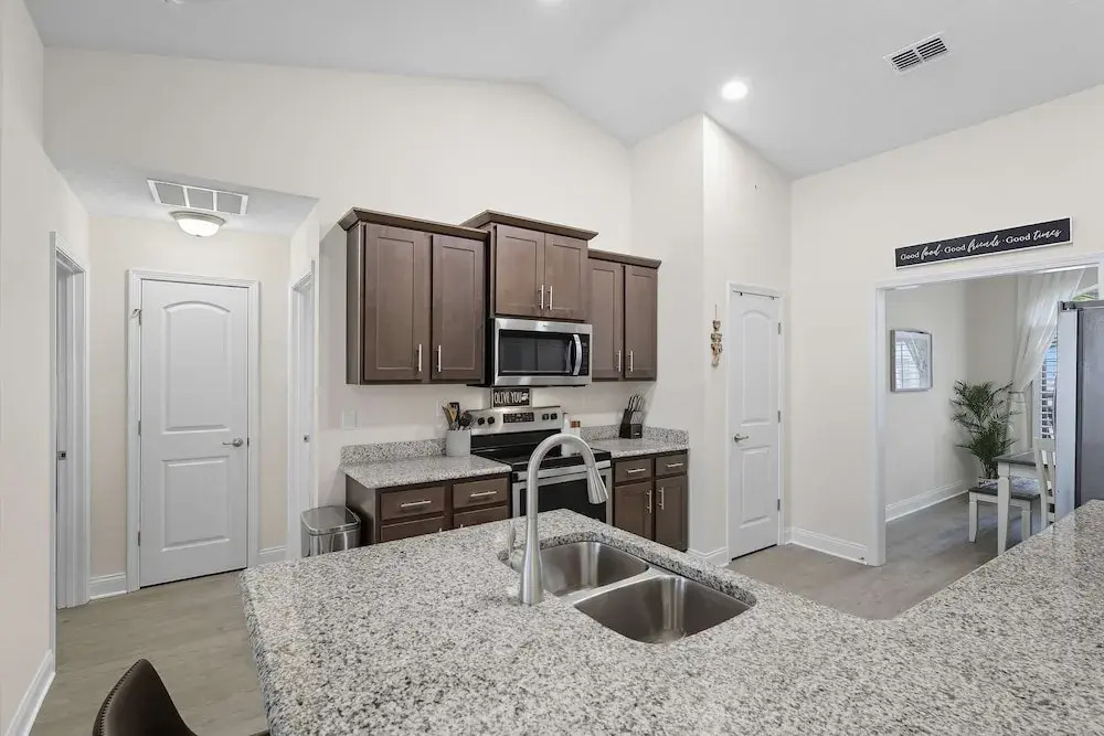 Modern 4BR Retreat Near Beach Heated Pool