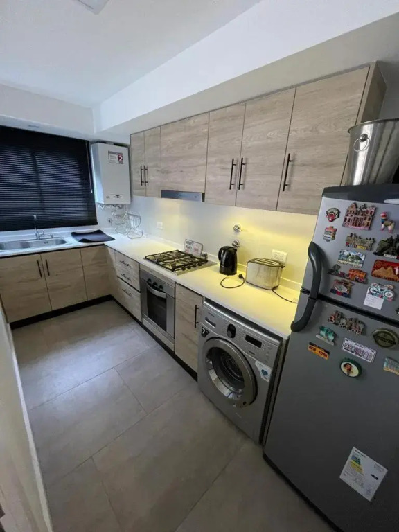 Departamento Moderno - Equipado y Con Cochera Privada