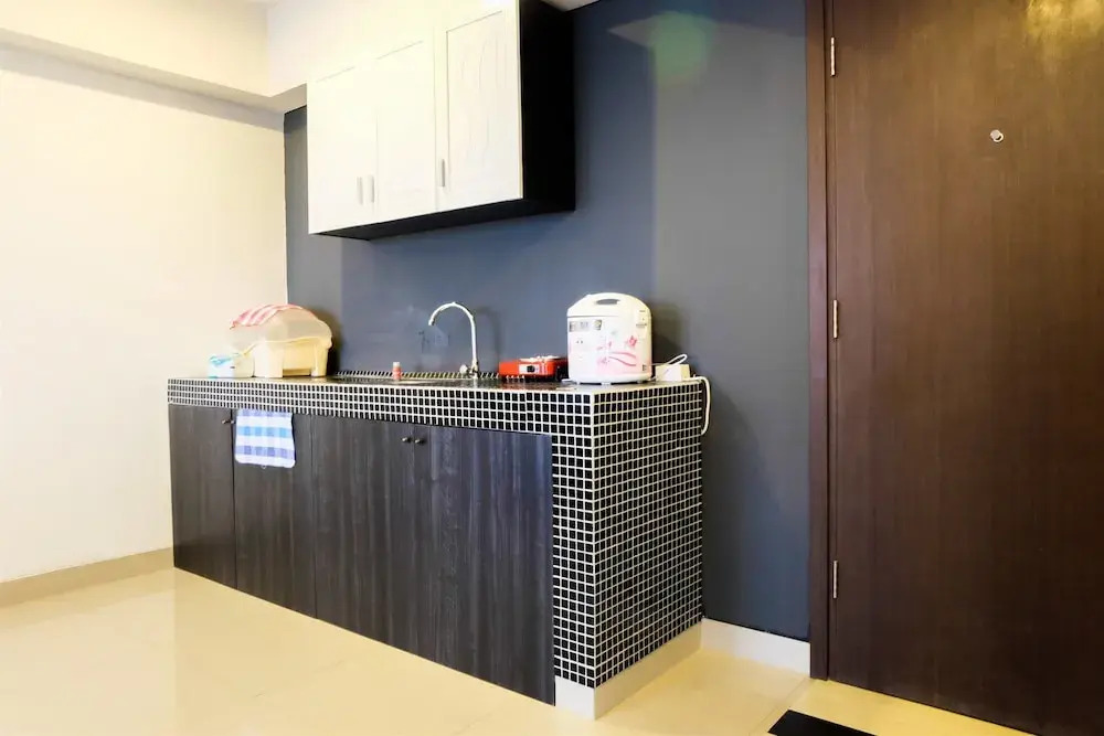 1BR Apartment with Sofa Bed at The H Residence