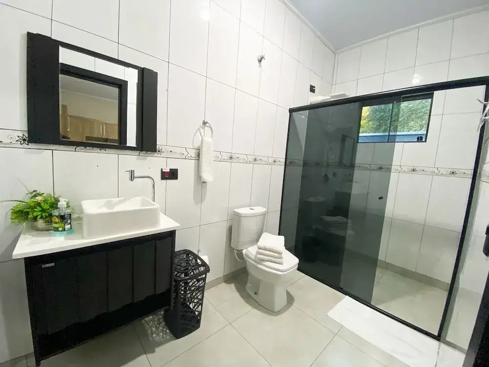 Casa Central piscina e AC para 8 hospede