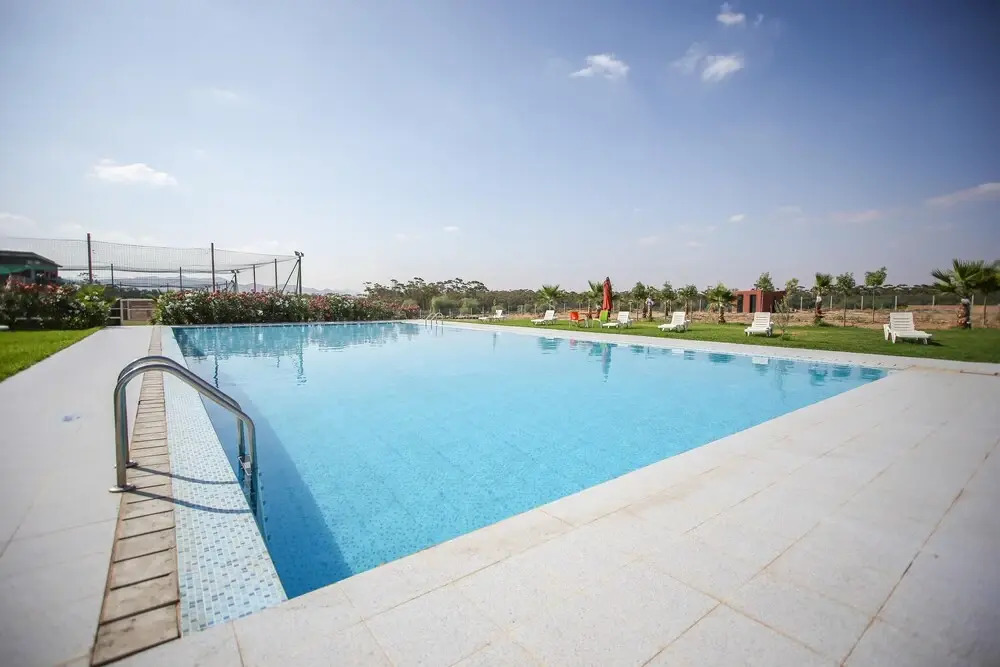Appartement neuf, entouré de verdure + piscine