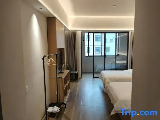 Haikou Zhouren Apartment (Wanda Plaza Convention and Exhibition Center)