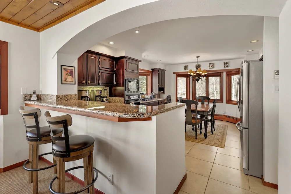 Ski-in/ski-out Townhome Near Adam's Ave Ski Access by The Woodrun V Townhouses by RedAwning