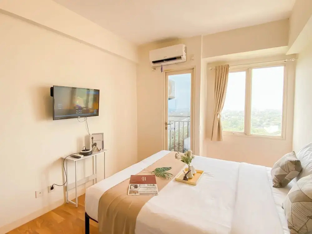 Cozy and Tranquil Studio at Podomoro Golf View Apartment