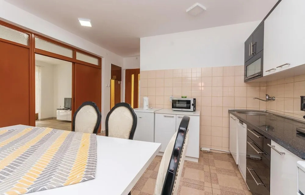Four-Bedroom Holiday Home In Pakostane
