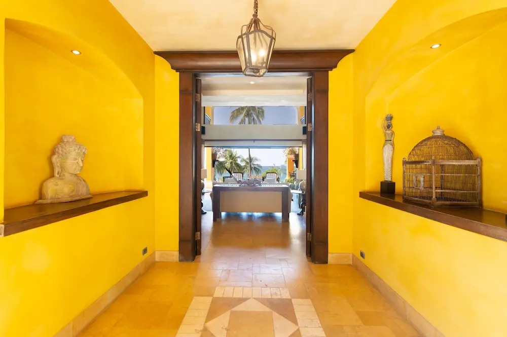 Elegant Mediterranean-Style Mansion with Beachfront Views and Private Infinity Pool