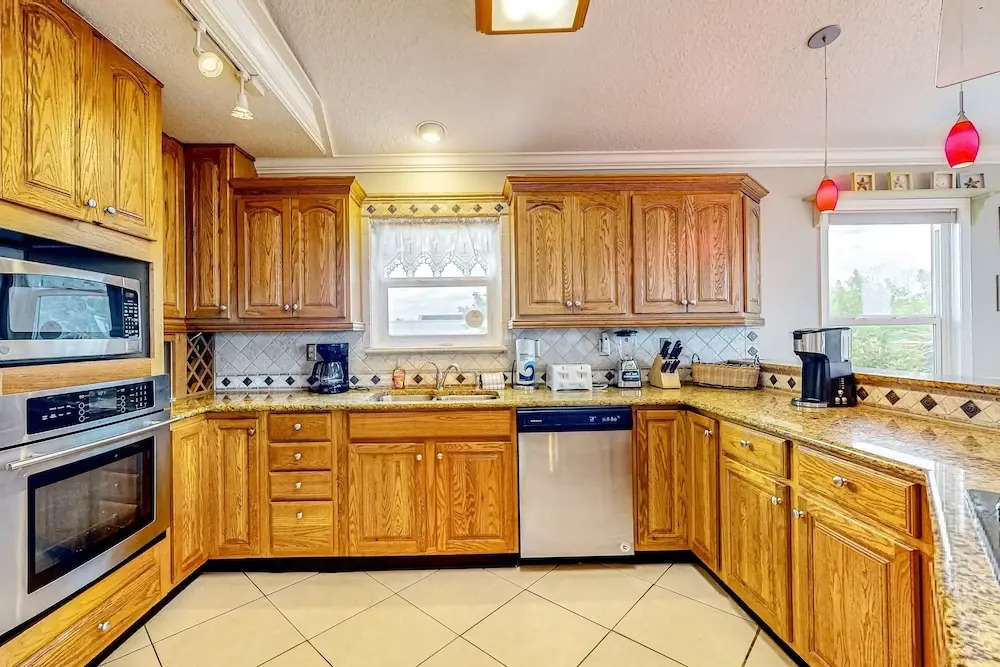 Tropical Gem w/ Courtyard & Large Deck Stroll 1 Block to Beach Boardwalk