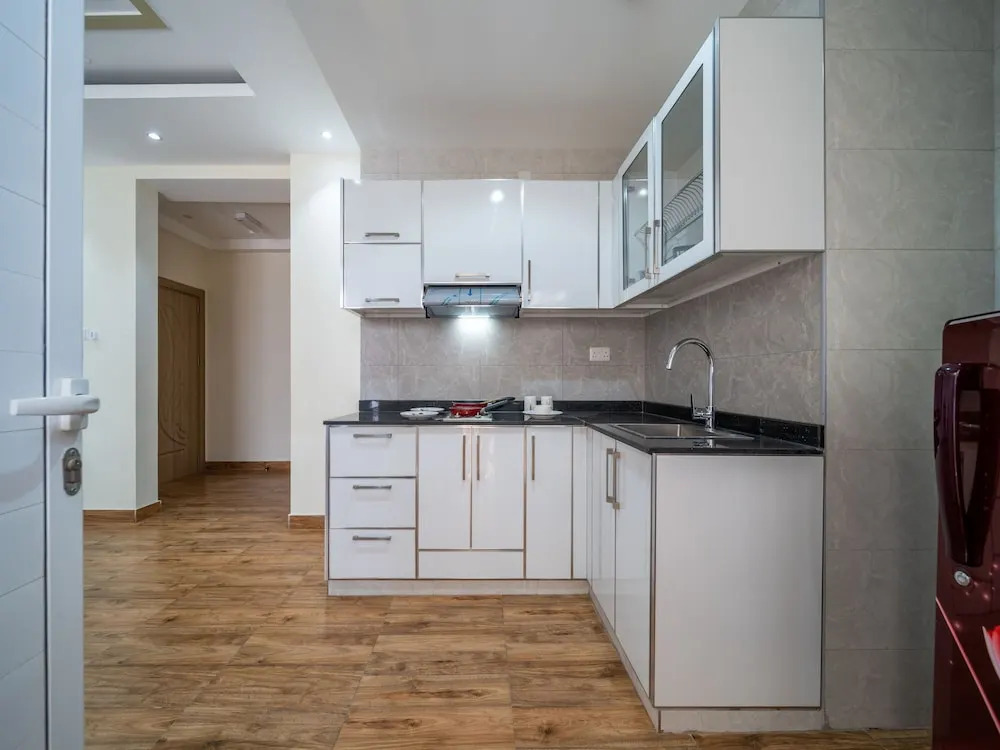 OYO Townhouse 156 Rose Hotel Apartments.