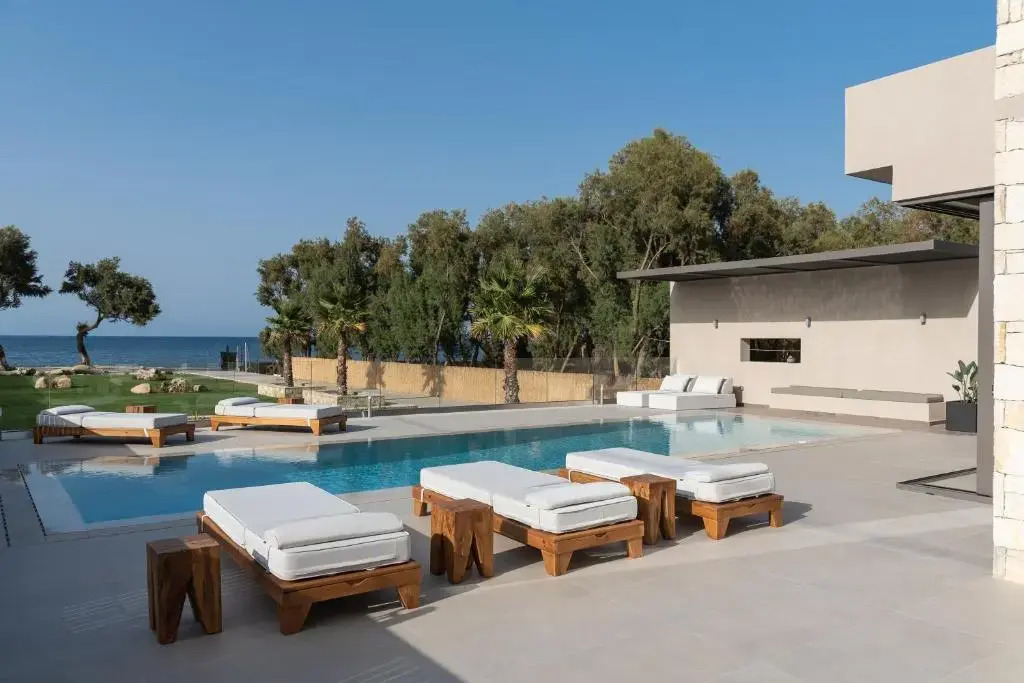 Artemis Villa, Beachfront Retreat with Heated Pool, By ThinkVilla