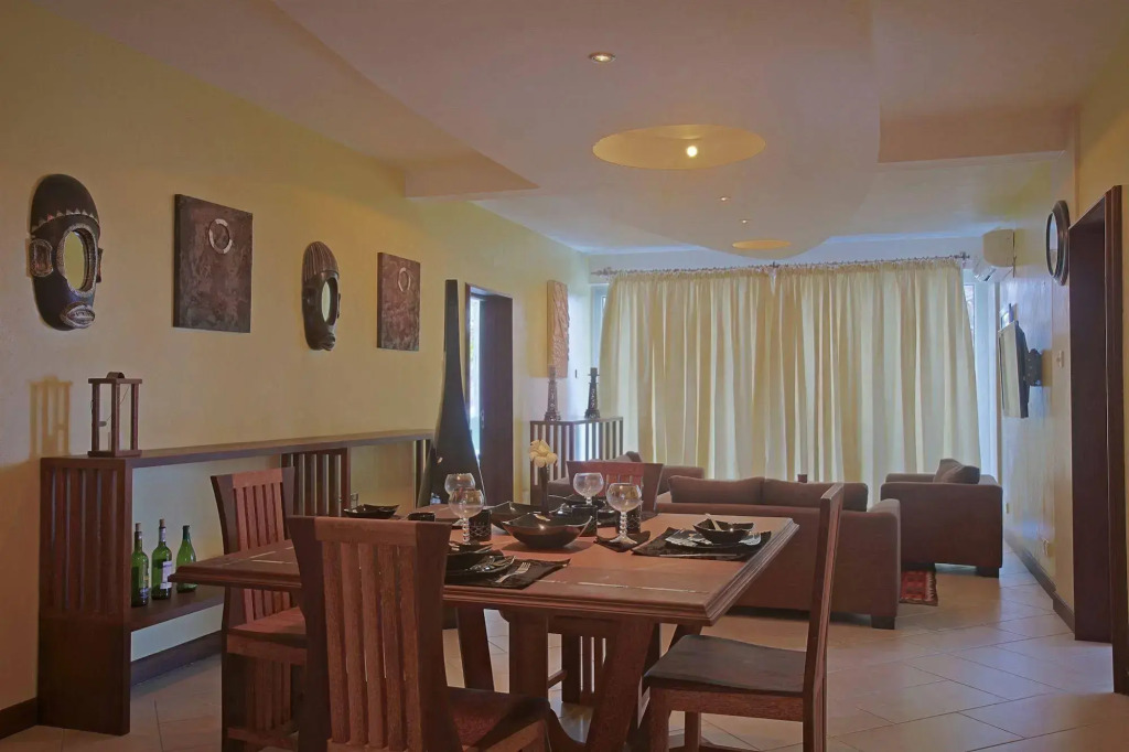 Cowrie Shell Beach Apartments Official