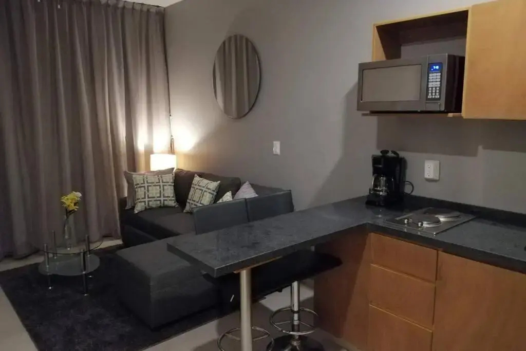 Modern 1 bedroom suite by beach Great location!