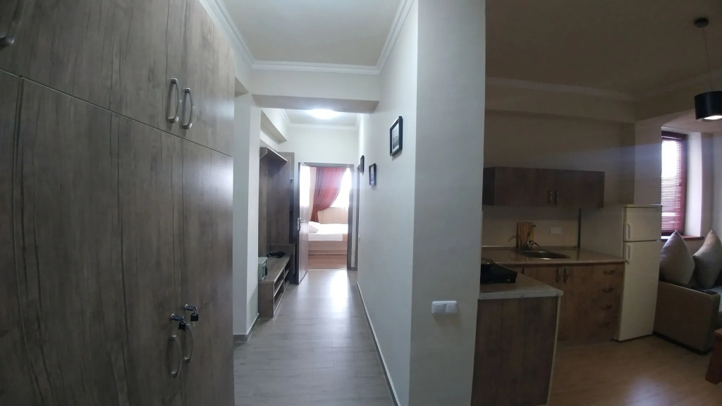 Отель Cross Apartments and Tours