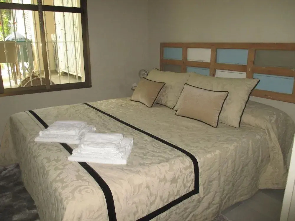 Apartamento Bizcocheros con piscina y jardín privado