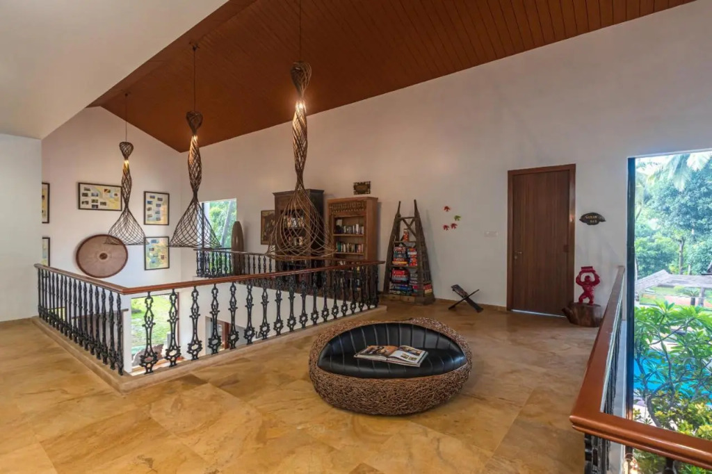 SaffronStays Casa Del Palms - 8BR luxury pool villa with gazebo, pickleball, bar & lawns near Nagaon Beach