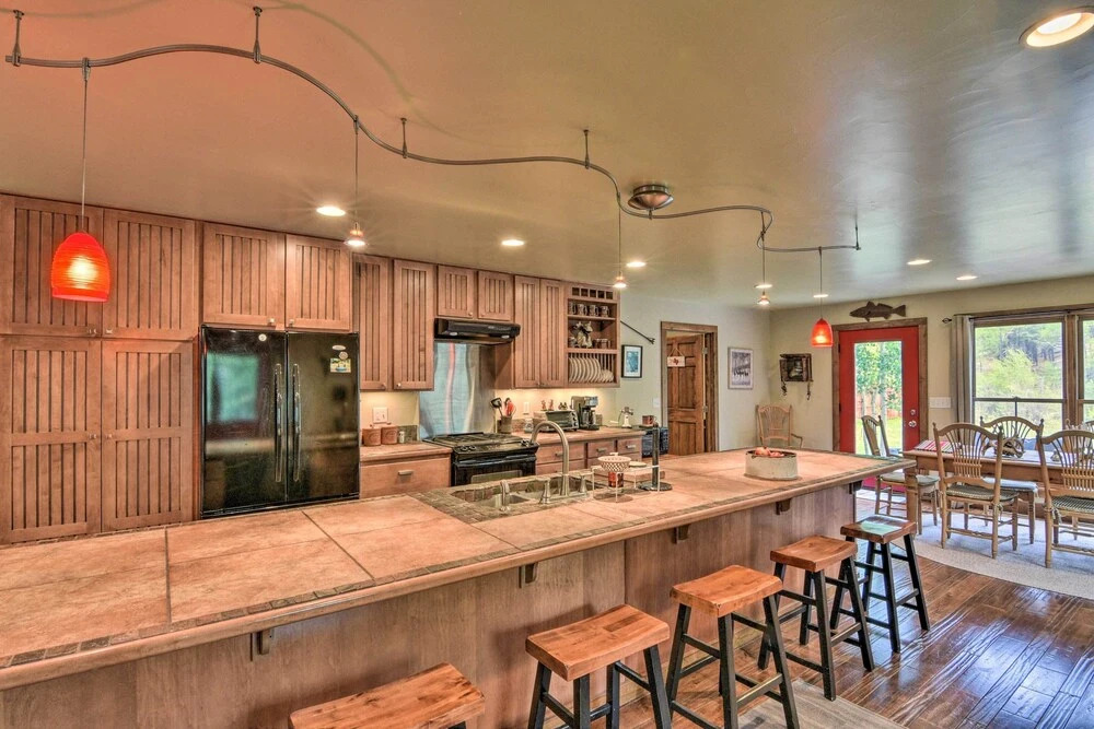 Riverfront Lake City Home w/ Fire Pit, Deck & BBQ