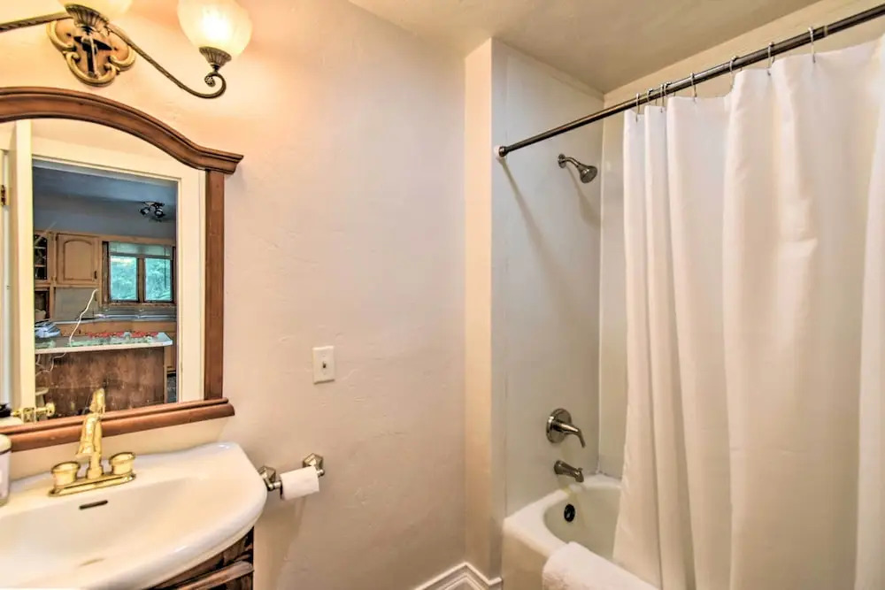 Walkable Lake Elkhart Apt: Dine, Shop, Swim!