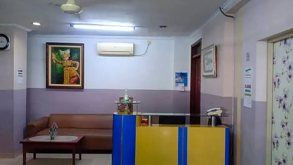 Super OYO 91104 Griya Mitra Residence