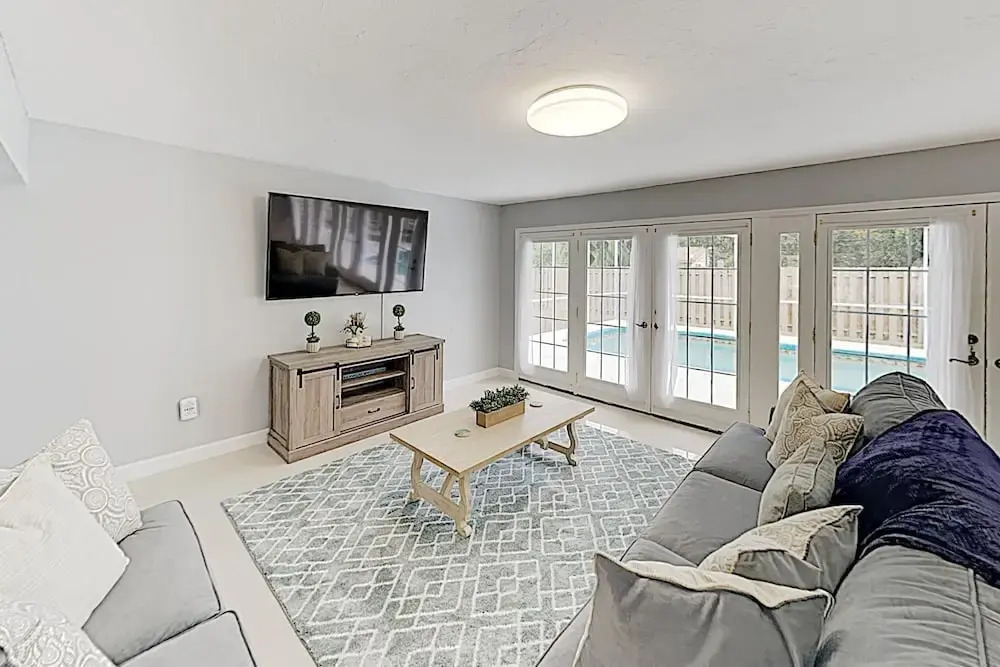 New Listing! Updated W/ Caged Pool & Patio 4 Bedroom Home