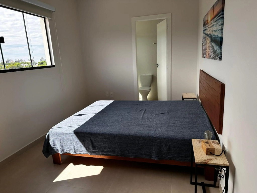 Encanto de apartamento, novo! A 290 metros da praia do Canto Grande!