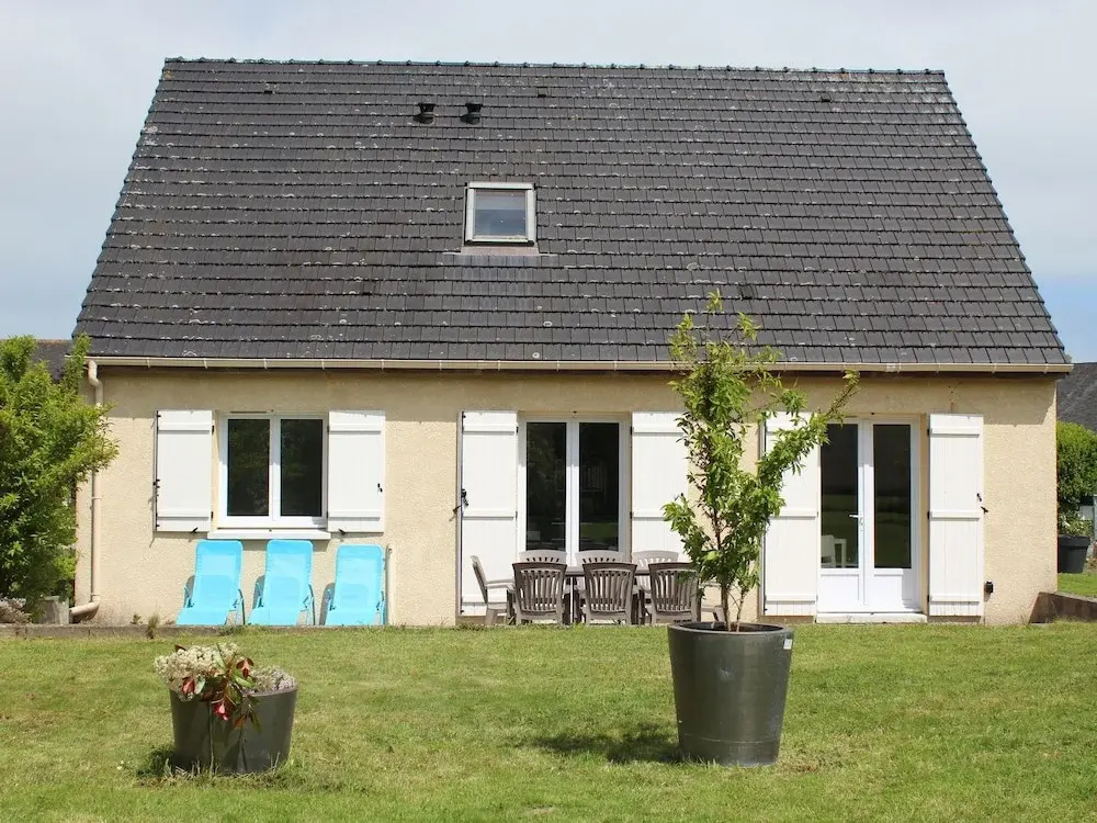 Sleek, Modern and Spacious Villa With the Invasion Beaches in the Back Garden