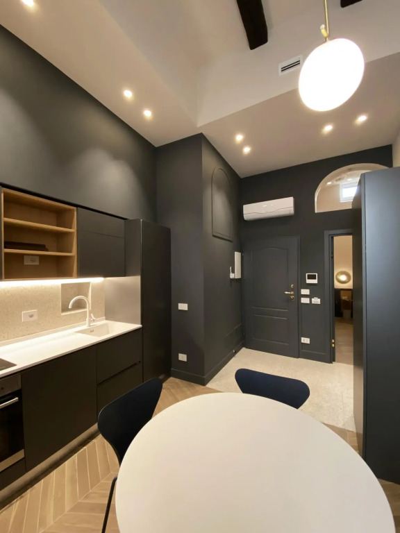 Apartment suitable for families or couples, equipped kitchen and laundry corner, private balcony-Mattia by Dimore Garibaldi