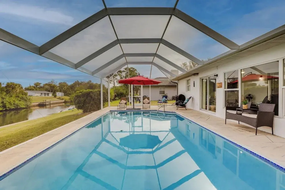 Riverfront Florida Retreat w/ Pool, Patio & Grill!