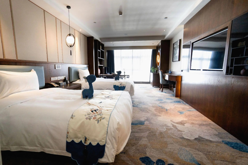 Tang Xiao-Zhu · Tangshan Feast Cultural and Tourism Hotel