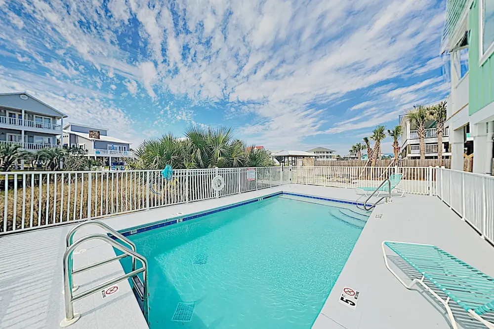 New Listing! Lagoon-front W/ Pool, Deck 2 Bedroom Townhouse