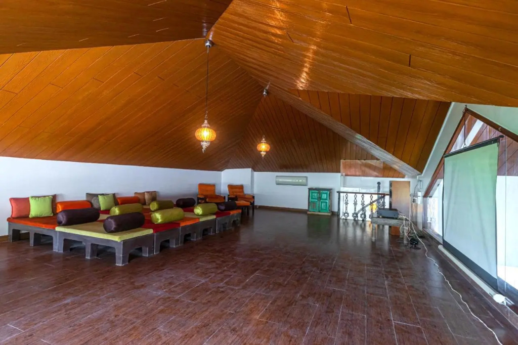 SaffronStays Casa Del Palms - 8BR luxury pool villa with gazebo, pickleball, bar & lawns near Nagaon Beach