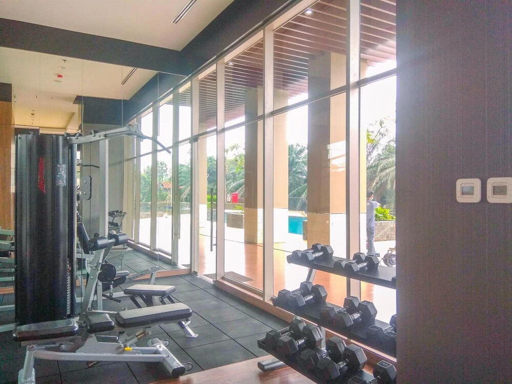 Warm And Minimalist Studio Room Transpark Cibubur Apartment