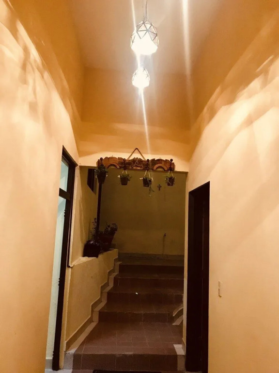 Capital O Las Calzadas Hotel & Suites