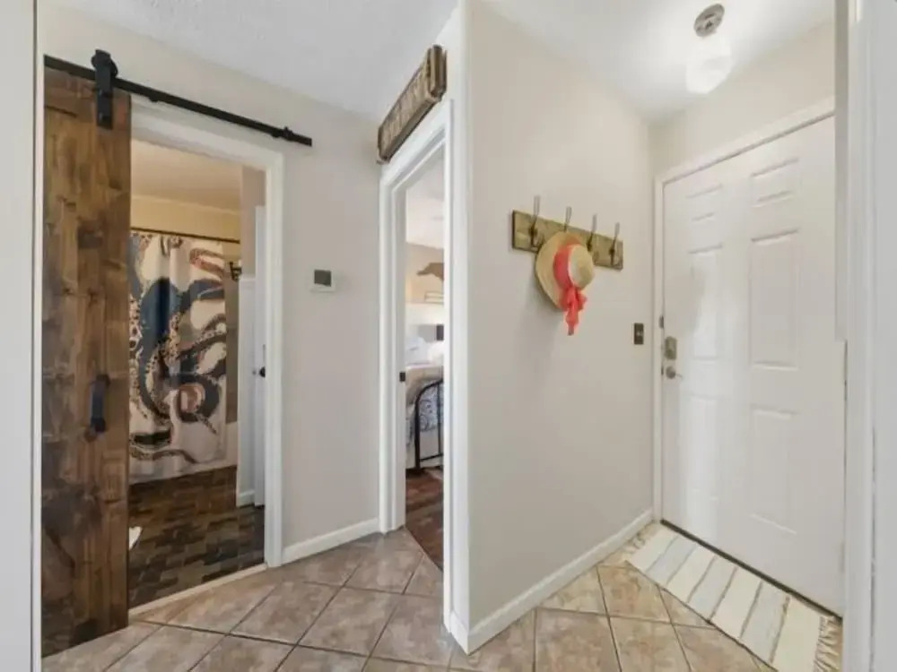 Conched Out - Feel The Ocean Breezes As You Relax On The Deck Overlooking The Lovely Carolina Beach Coastline 2 Bedroom Condo by RedAwning