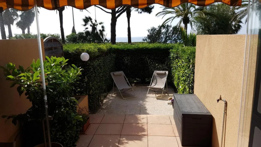 T2 rez de jardin front de mer