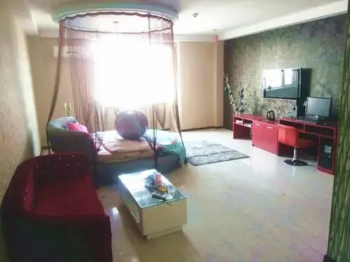 Tangtang Theme Apartment Holiday Hotel