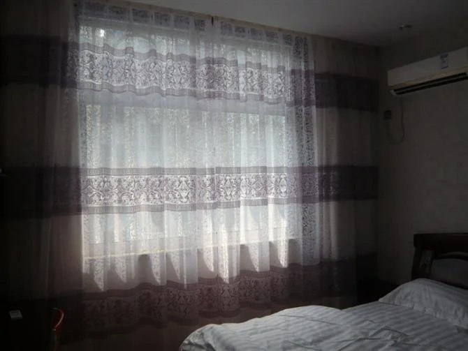 Yangzhong Sanmao sunshine Motel