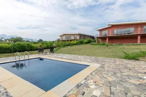 StayVistas Shivom Villa 5 - A Serene Escape with Views of the Valley and Lake