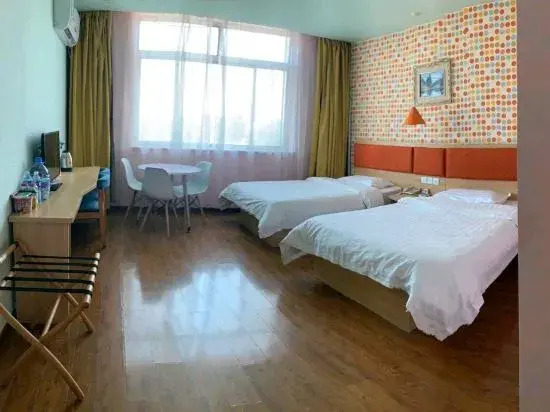 Homeinn Pebble Hotel