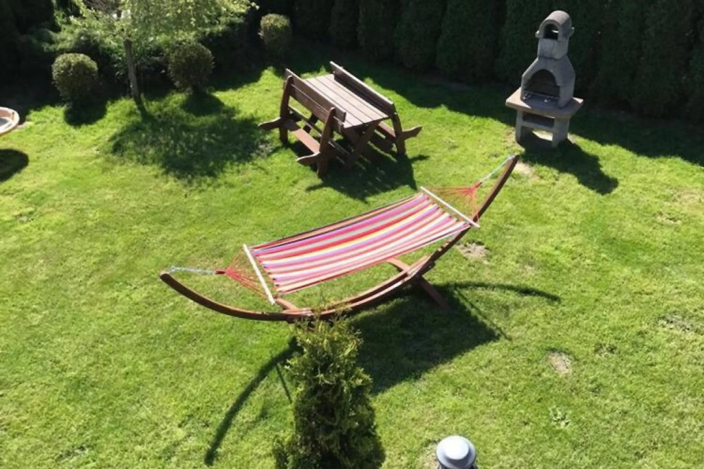 Half of holiday home, terrace, playground