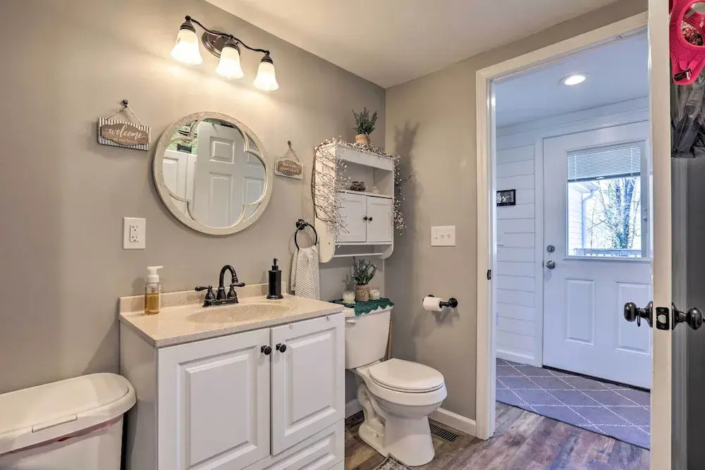 Quaint Creekside Cottage w/ Porch & Backyard!