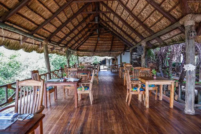 Saadani Safari Lodge - bush, river, beach