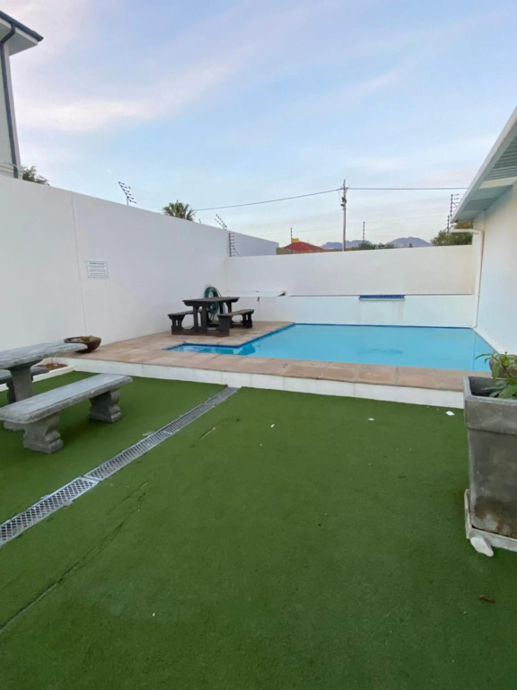 Cozy two bedroom unit in Strand with pool gym and laundromat